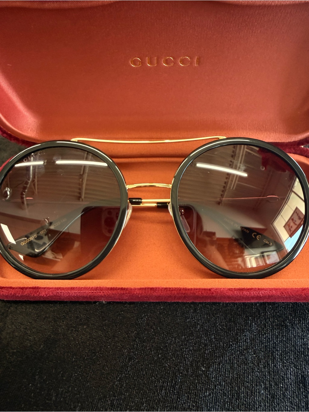 Gucci Round Black And Gold Sunglasses